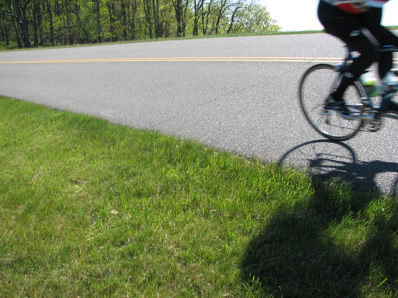 Cyclist passing on Blue Ridge Parkway.