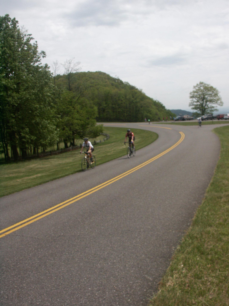 Cyclists leaving an overlook.